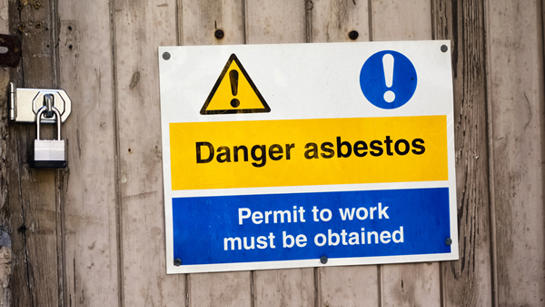 Warning sign about asbestos.