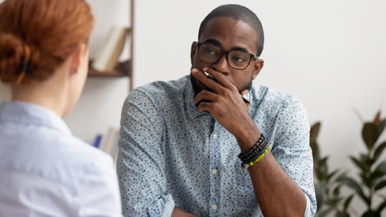 Man Listening To Complaint