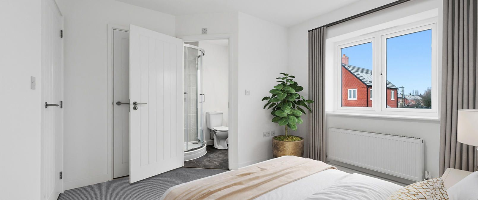 Three Bedroom House Master Bedroom With Ensuite Staged