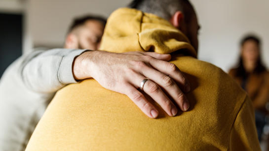 Man Embracing