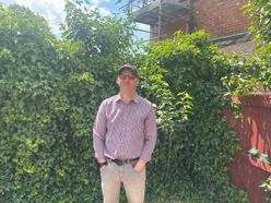 Wayne standing in the garden.