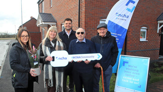 Partners present key to resident