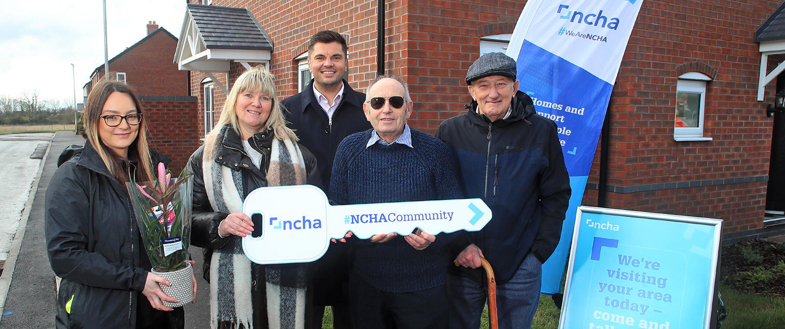 Partners present key to resident