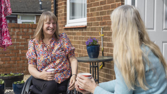 People talking in garden